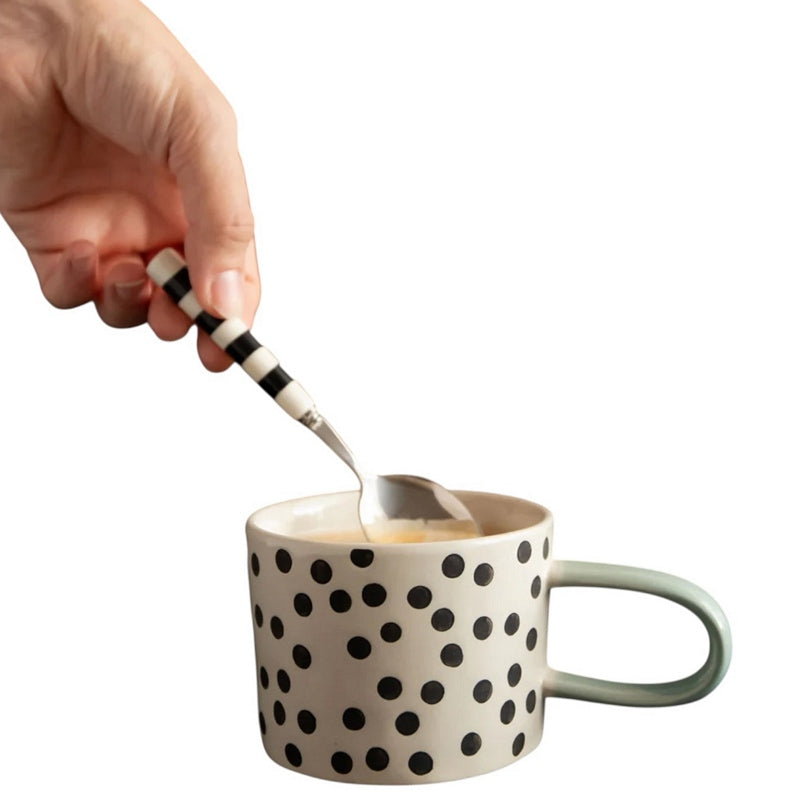 Caroline Gardner Mono Ditsy Spot Ceramic Mug MGG120 in use