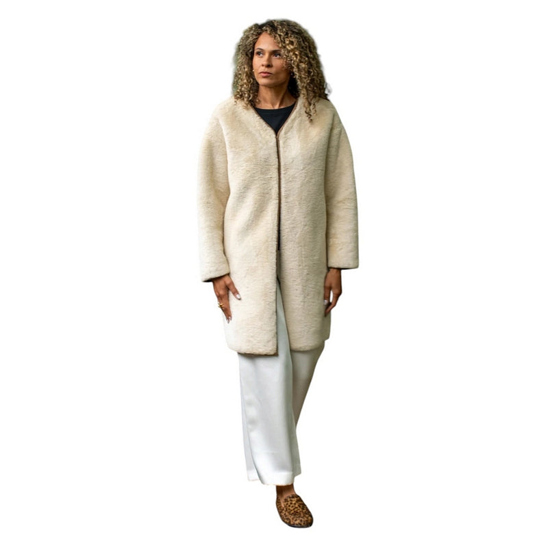 Chalk Clothing Bev Coat Cream on model 1 front