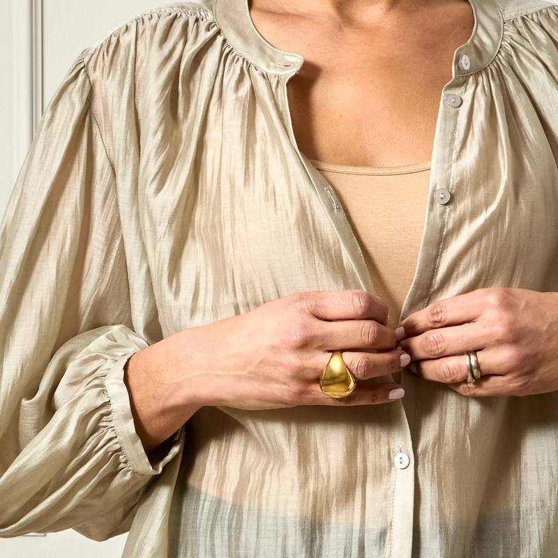 Chalk Clothing Cia Vest in Nude on model with blouse over