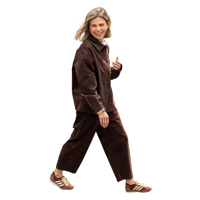 Chalk Clothing UK Kelly Cord Trousers Warm Chocolate on model walking