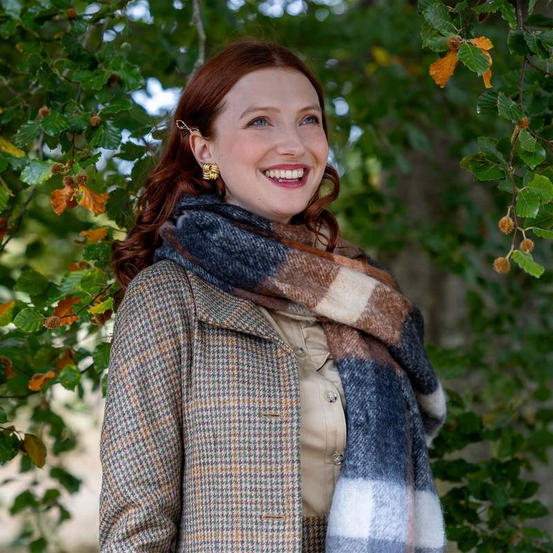 Dents Check Scarf with Tassle Ends Charcoal and Chocolate 4-2904 on model 1