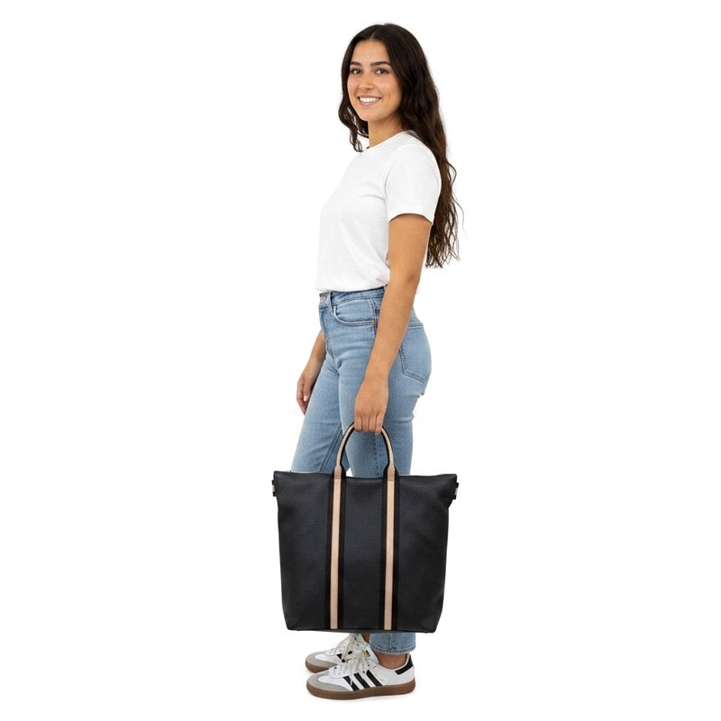 Italian Leather Multi Shoulder and Backpack in Navy held by model