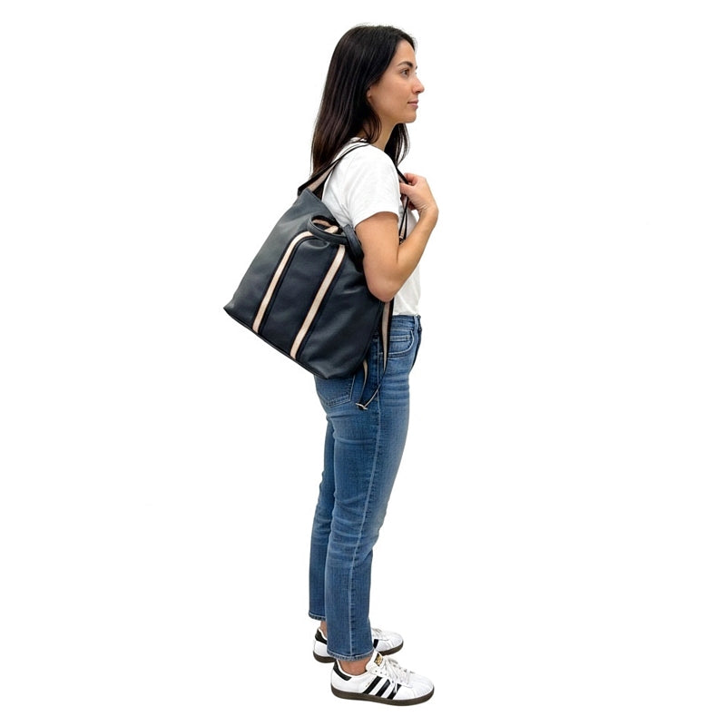 Italian Leather Multi Shoulder and Backpack in Navy on model's shoulder