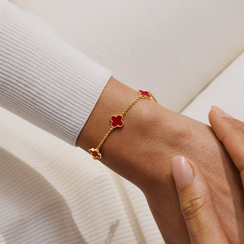 Joma Jewellery Signature Clover Collection Red Clover Bracelet Gold 10576 on model 1