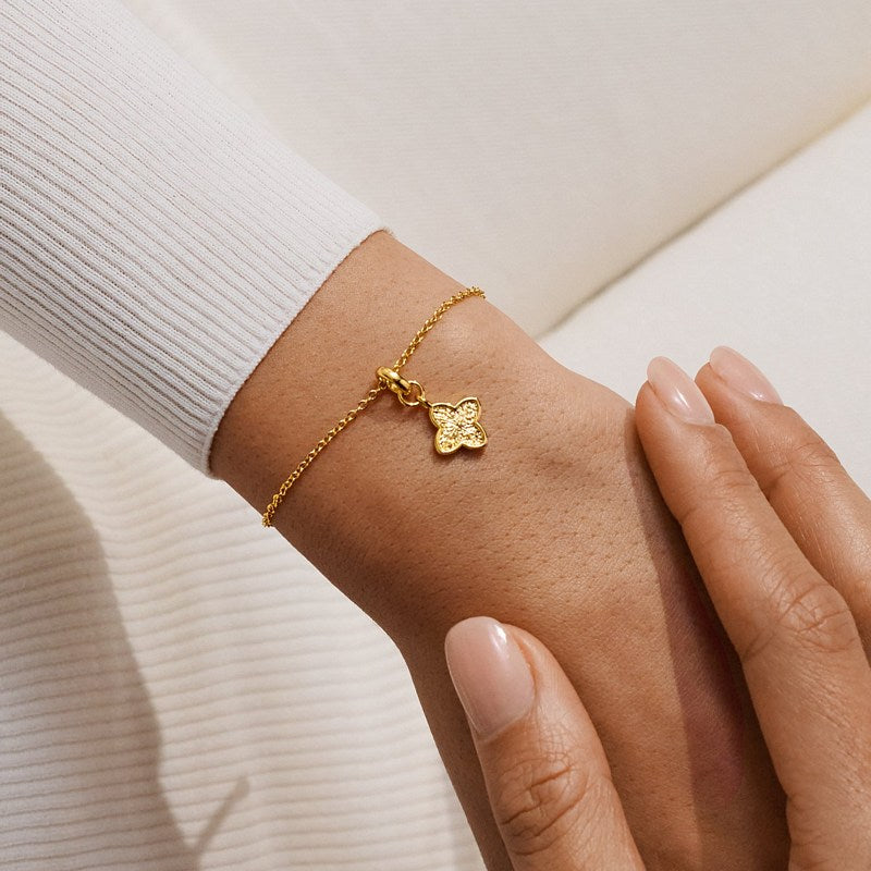 Joma Jewellery Signature Clover Collection Textured Clover Bracelet Gold 10582 on model's wrist