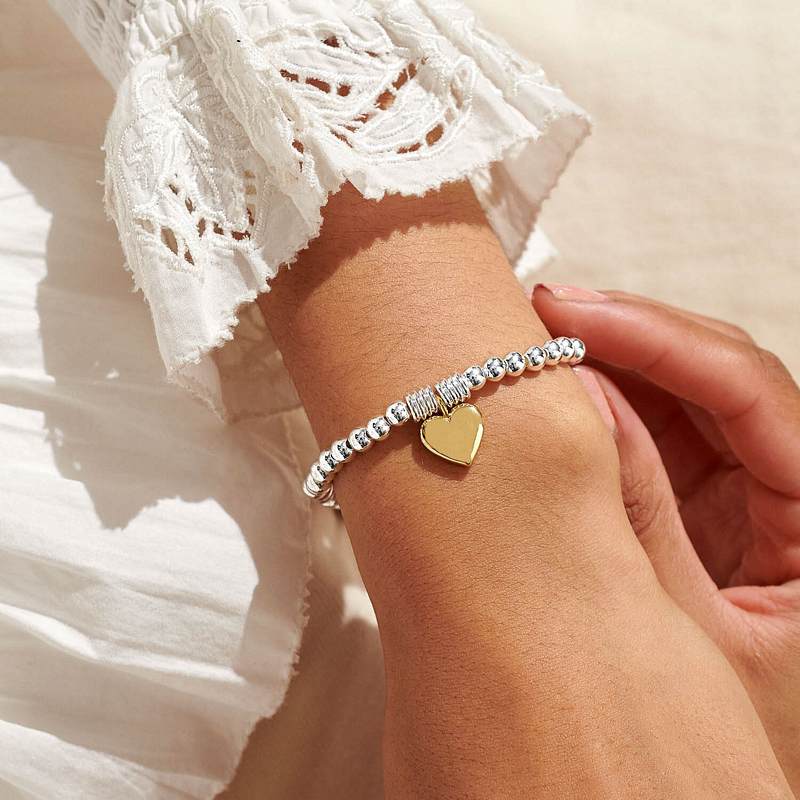 Joma Jewellery Silver Bracelet Bar Gold Heart 7211 on model