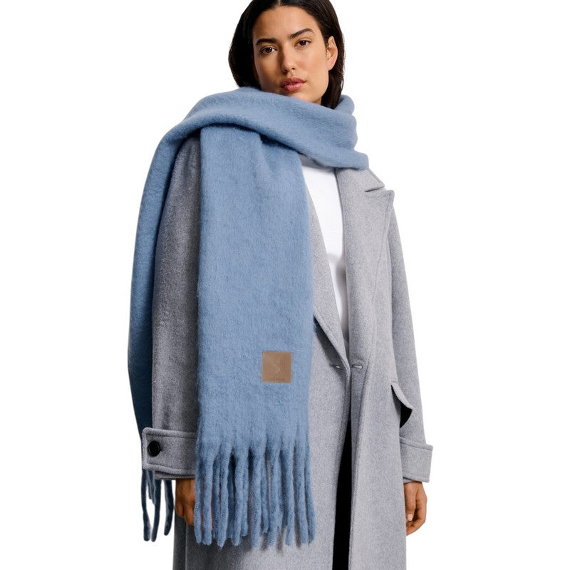Katie Loxton Recycled Tassle Scarf in Blue on model