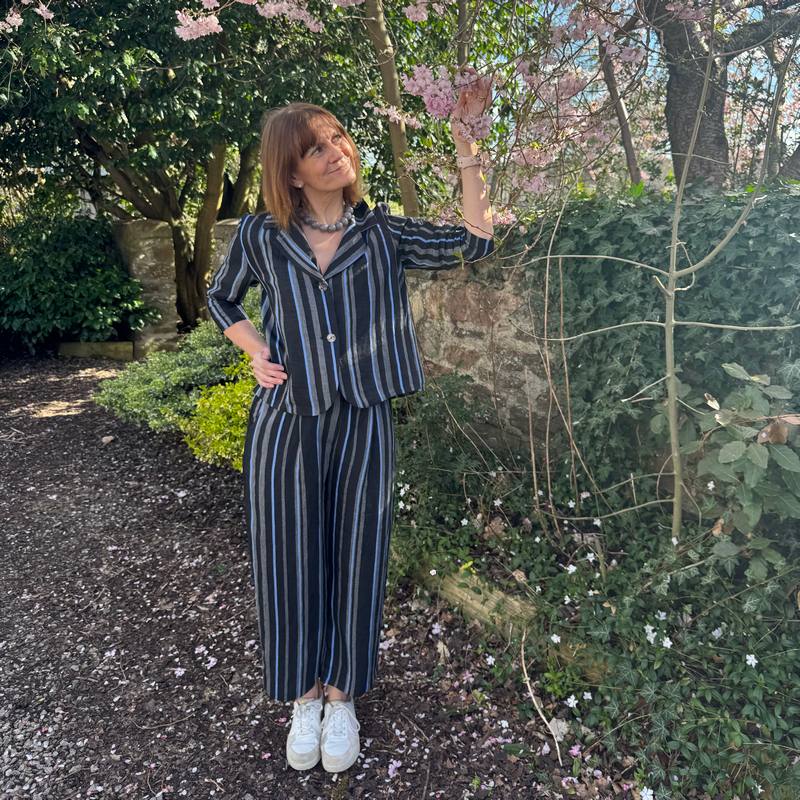 Neirami Clothing Trousers with Pleats Riga Sky Striped on model