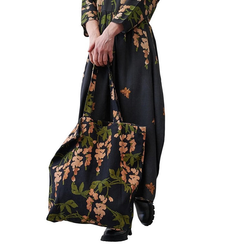 One Hundred Stars Wisteria Canvas Bag Black held by model