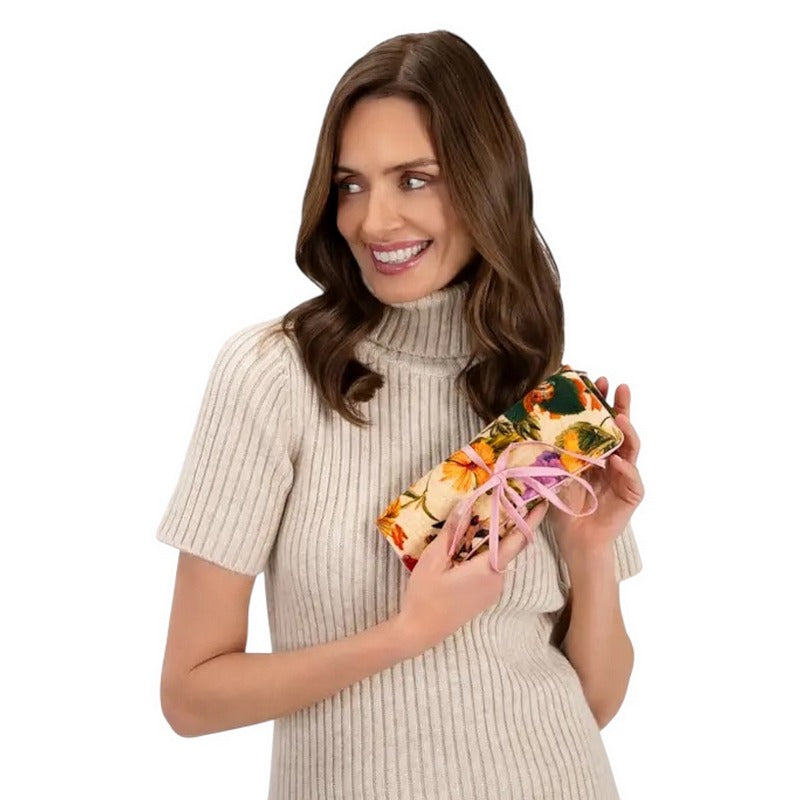 Powder Designs Velvet Jewellery Roll Cream Posy JR05 held by model