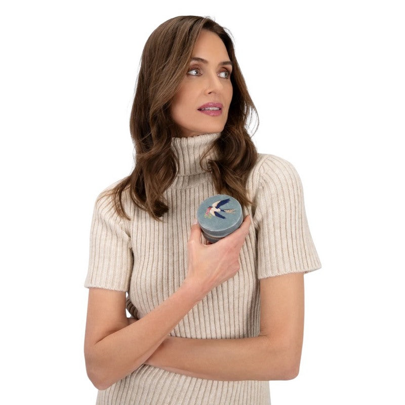 Powder UK Round Travel Jewellery Box Swooping Swallows Ice RJBX6 held by model