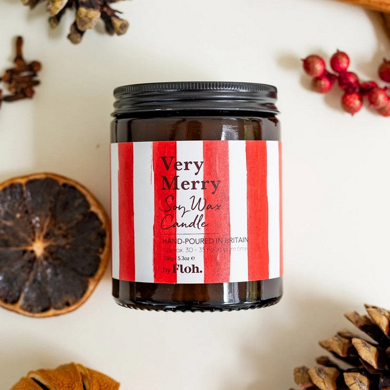 Toasted Crumpet Designs Very Merry Apothecary Candle in Glass Jar flatlay
