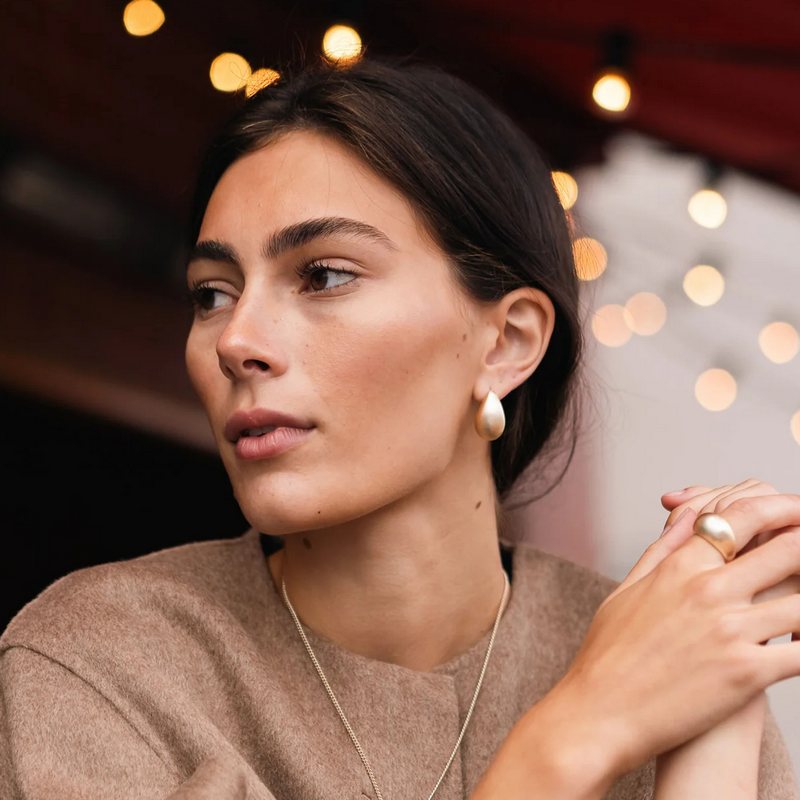 Tutti & Co Jewellery Hush Earrings Brushed Gold EA578G on model 3