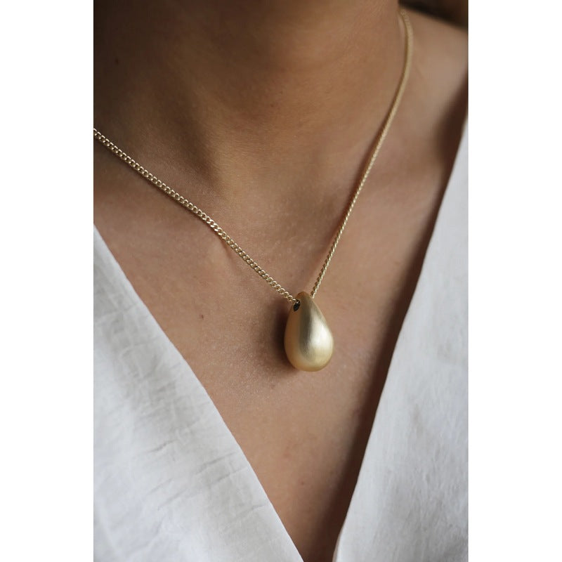 Tutti & Co Jewellery Hush Necklace Brushed Gold NE681G on model 2