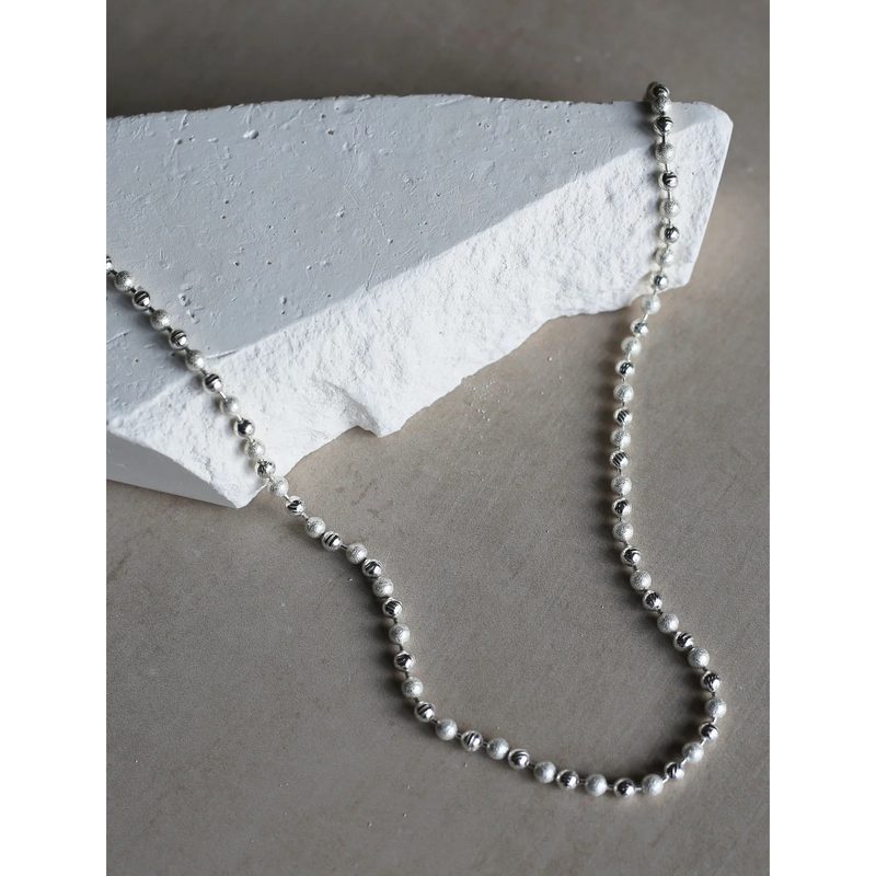 Tutti & Co Valley Necklace Silver NE699S on stone