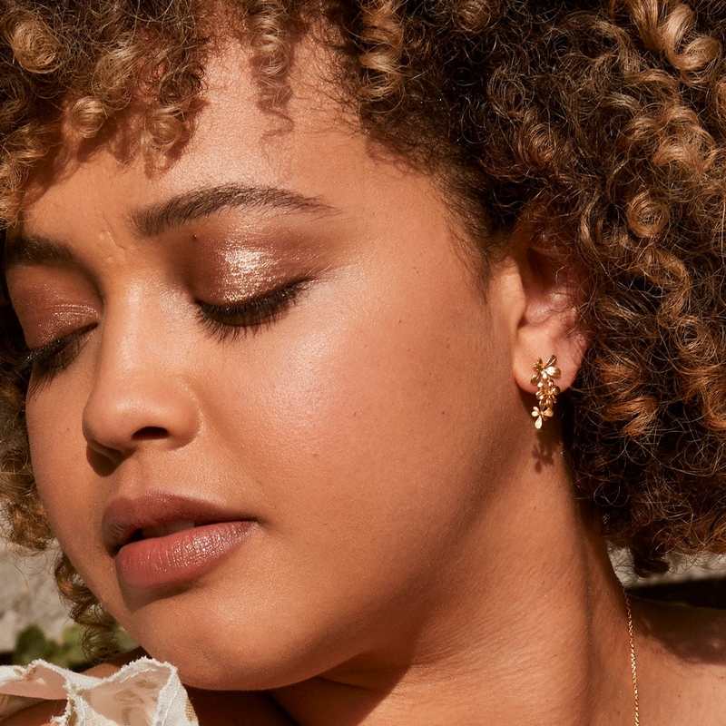 Alex Monroe Jewellery Sprouting Rosette Drop Earrings Gold Plate HBE2-GP on model