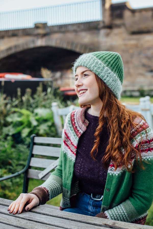 Eribe Alpine Cardigan in Watercress on model 2