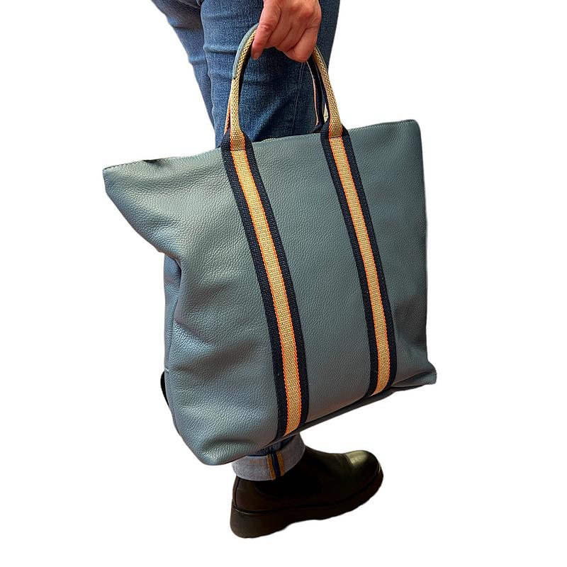 Italian Leather Multi Shoulder and Backpack Denim Blue in hand