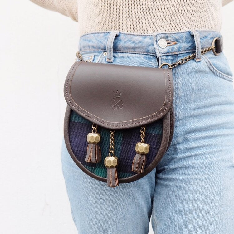 Nixey Blackwatch Sporran Handbag in Brown Leather with Bronze Fittings on model as bum bag