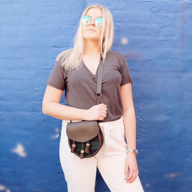 Nixey Blackwatch Sporran Handbag in Brown Leather with Bronze Fittings as cross-body bag on model