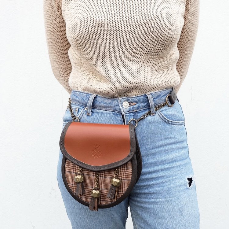 Nixey Glen Keith Tweed Sporran Handbag in Chestnut Leather with Bronze Fittings on model as bum bag