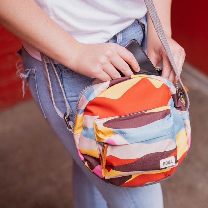 Roka Crossbody Bag Paddington B Small Sustainable Retro Camo in use