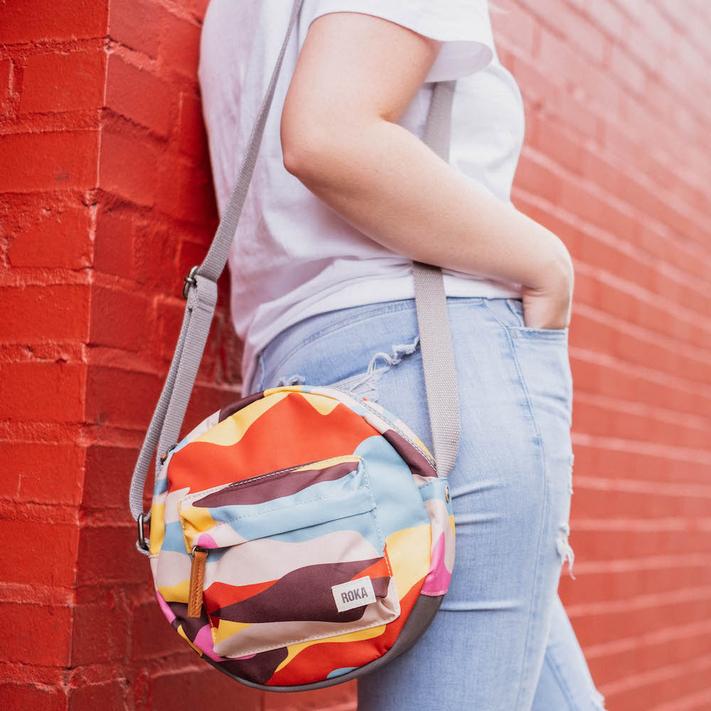 Roka Crossbody Bag Paddington B Small Sustainable Retro Camo on model