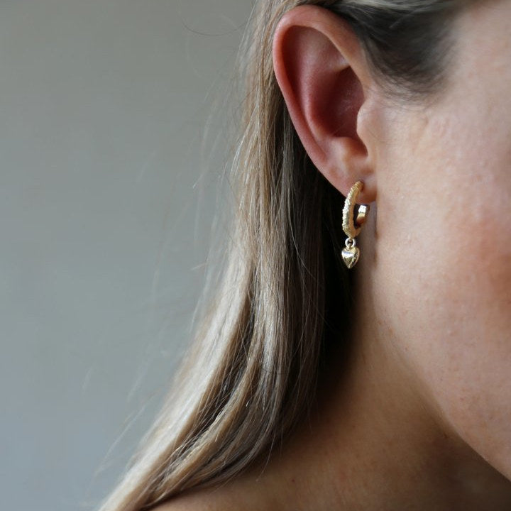 Tutti & Co Courage Heart Earrings Gold Plate EA387G on model