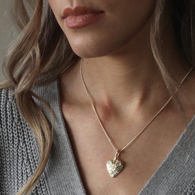 Tutti & Co Courage Necklace Gold Plate NE517G on model textured side
