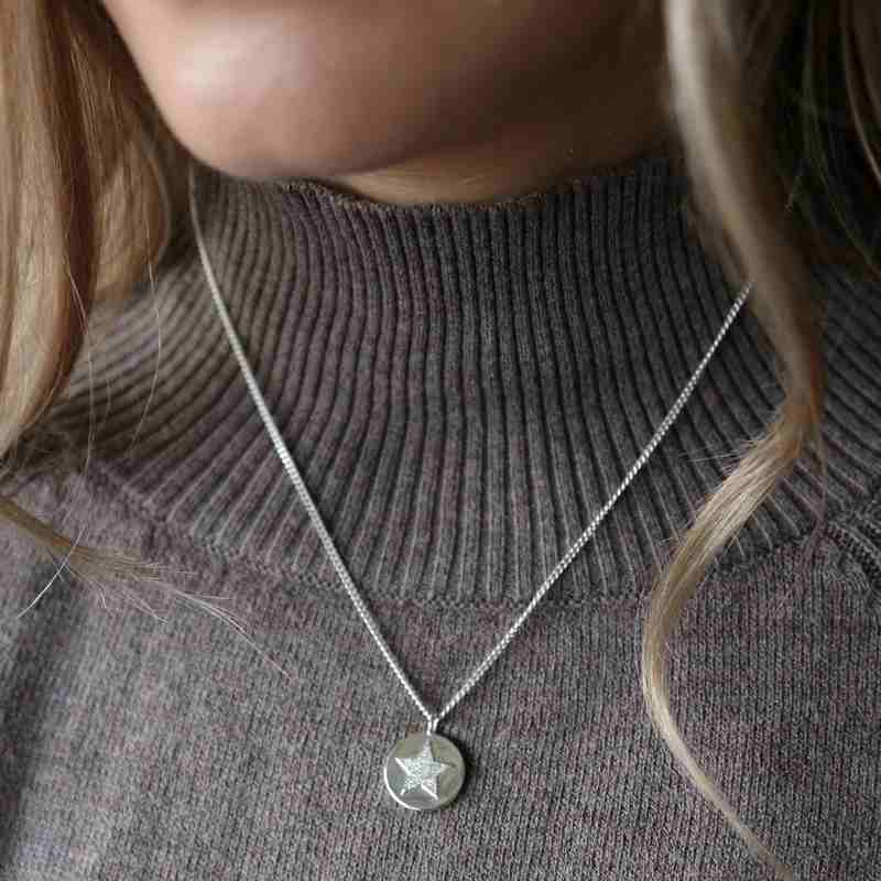 Tutti & Co Sky Necklace Silver NE527S on model with jumper