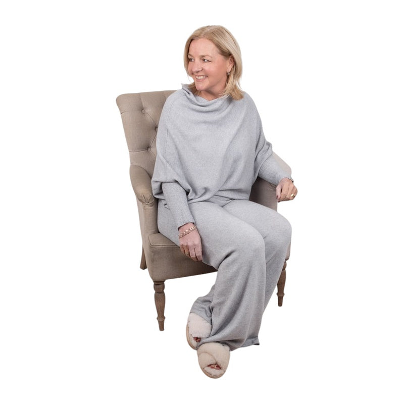 Amazing Woman Clothing Emilie Asymmetric Jumper in Silver Grey EMILIE-SILVR020 model sitting