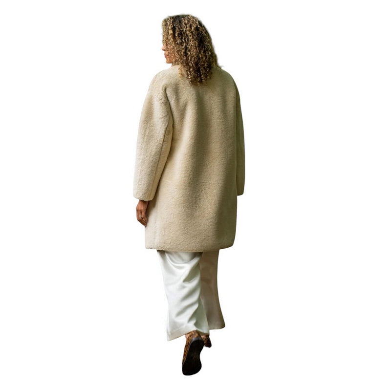Chalk Clothing Bev Coat Cream on model 1 rear