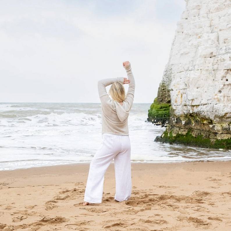 Chalk Clothing Greta Hoody in Off-white on model at beach