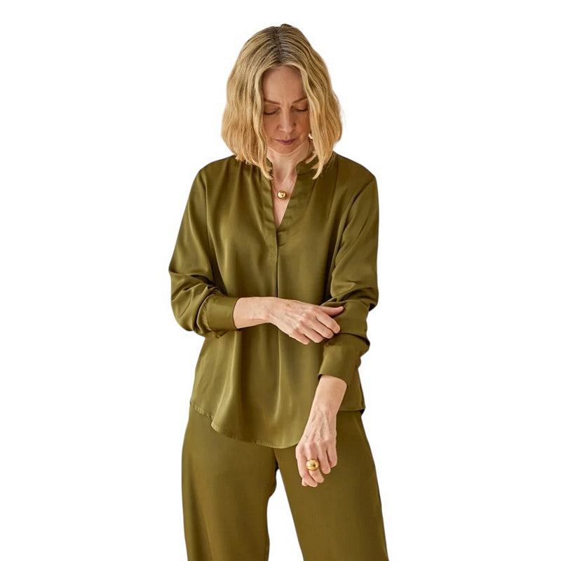 Chalk Clothing Josie V-neck Shirt Avocado on model pulling up sleeves
