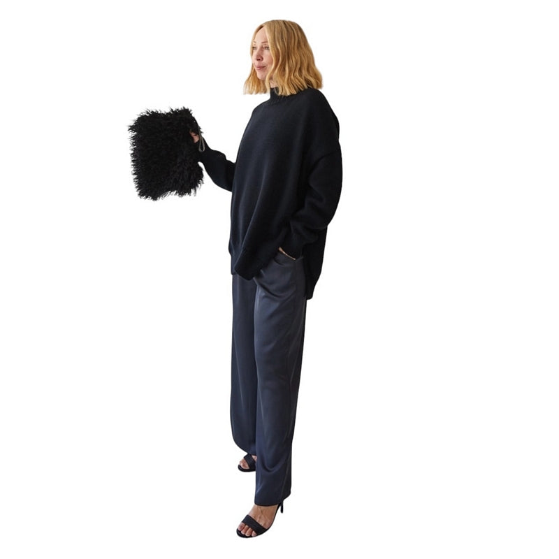 Chalk Clothing Thea Pant in Gun Metal One Size on model with bag