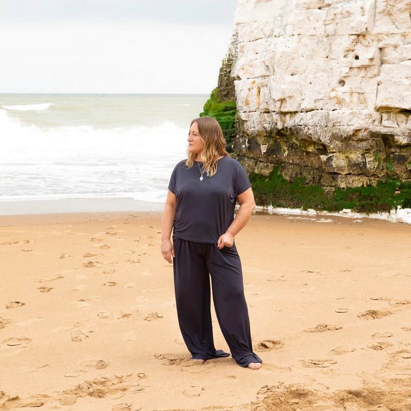 Chalk Clothing Violet Lounge Pants in Smoke on model at beach