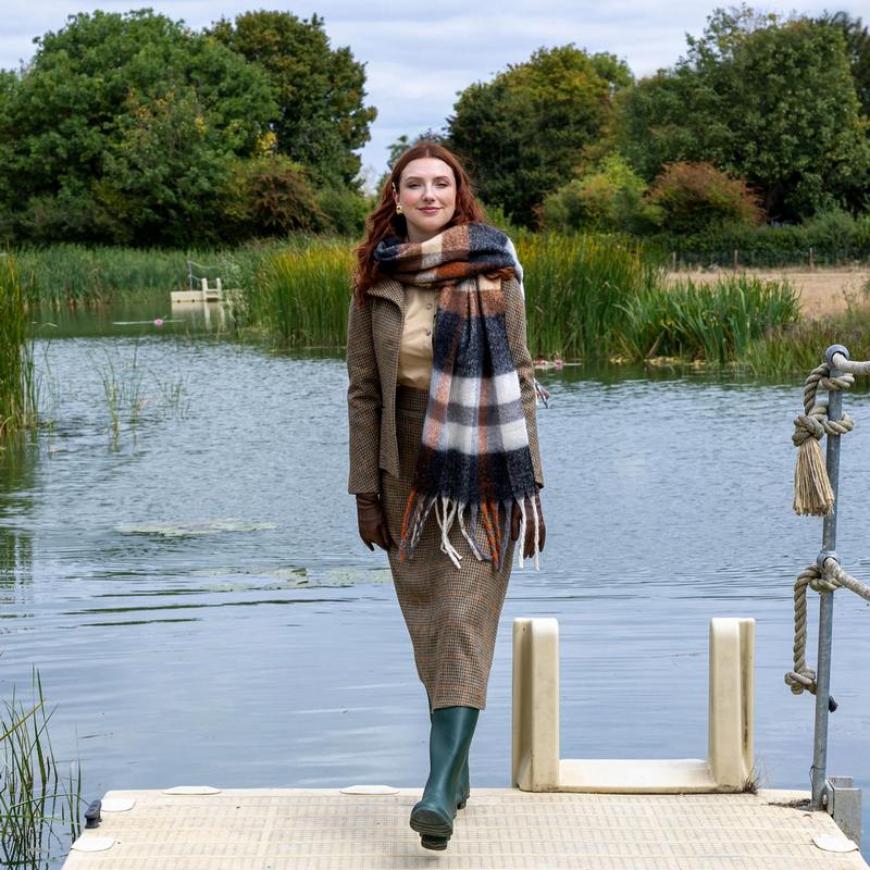 Dents Check Scarf with Tassle Ends Charcoal and Chocolate 4-2904 on model 2