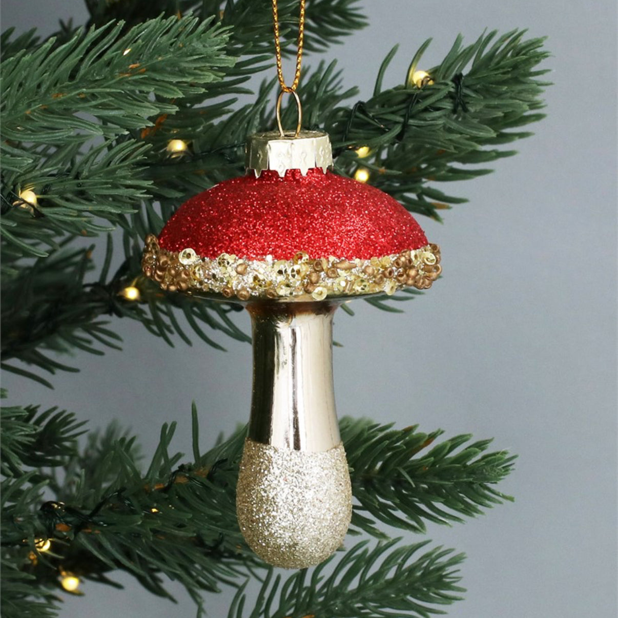 Gisela Graham Red & Gold Capped Glass Toadstool Decoration 01275 on tree