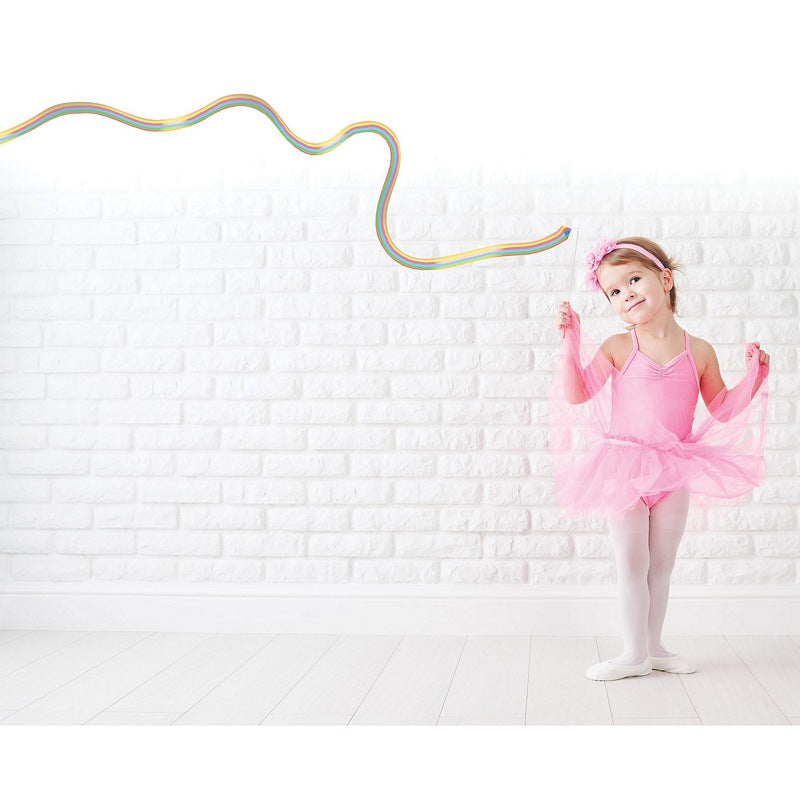 House Of Marbles Rainbow Dancer Mini Ribbon Wand 213061 with girl