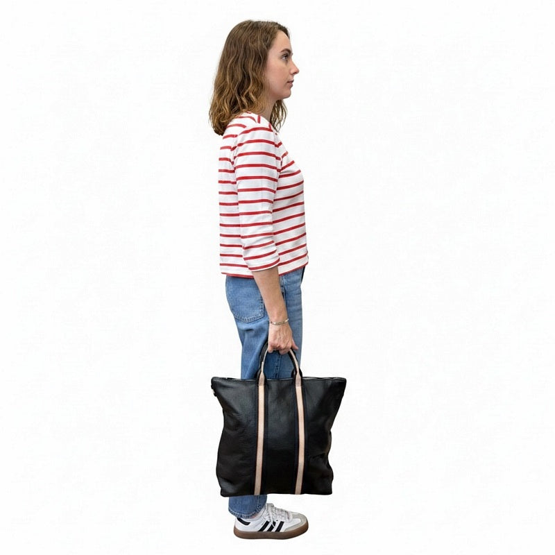 Italian Leather Multi Shoulder and Backpack in Black held by model