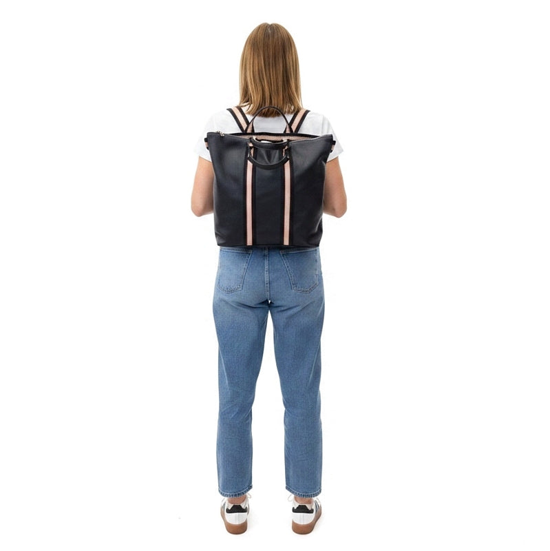 Italian Leather Multi Shoulder and Backpack in Navy on model's back