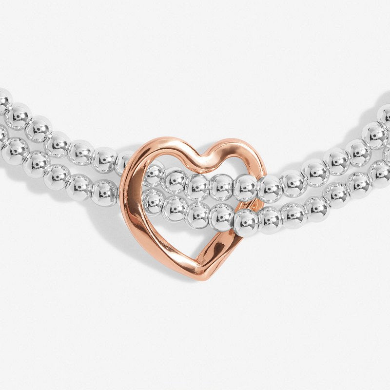 Joma Jewellery Silver Bracelet Bar Twist Heart 7206 close up