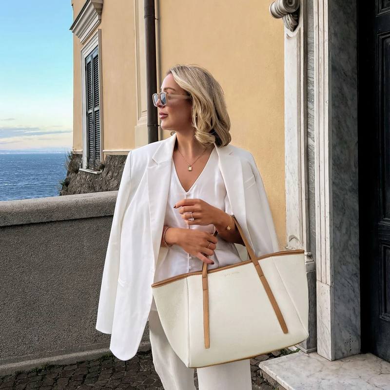 Katie Loxton Capri Canvas Tote Bag in Tan and Off White KLB3380 on model