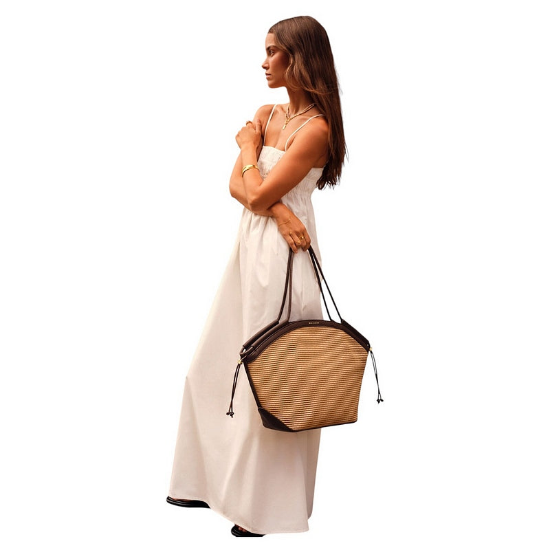 Katie Loxton Florence Tote Bag Natural Raffia Bitter Chocolate KLB4453 held by model