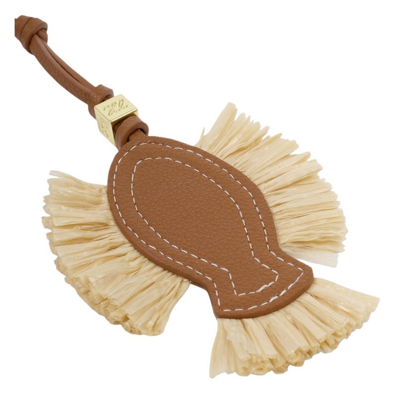 Katie Loxton Raffia Fish Bag Charm Cognac KLB4600 angled