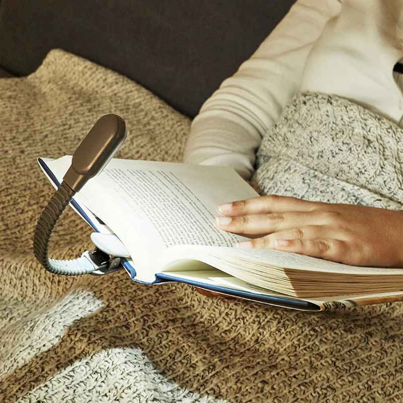 Kikkerland Rechargeable Clip Book Light Black BL13-BK lifestyle