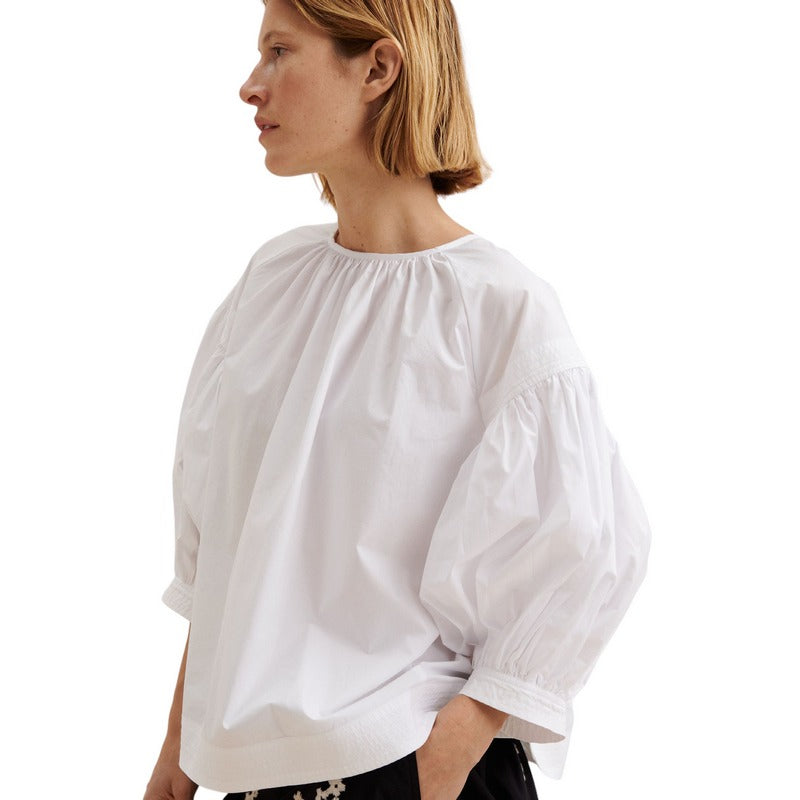 Masai Clothing Ma Dorita Oversize Top in White 1007821-1000S on model angled