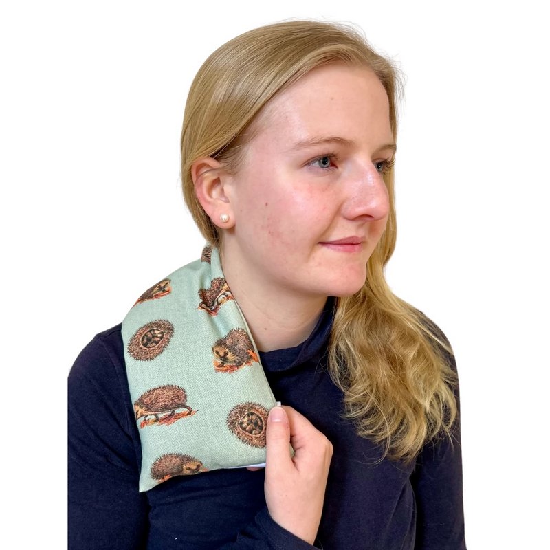 Microwavable Lavender Scented Wheatbag Woodland Hedgehog on model