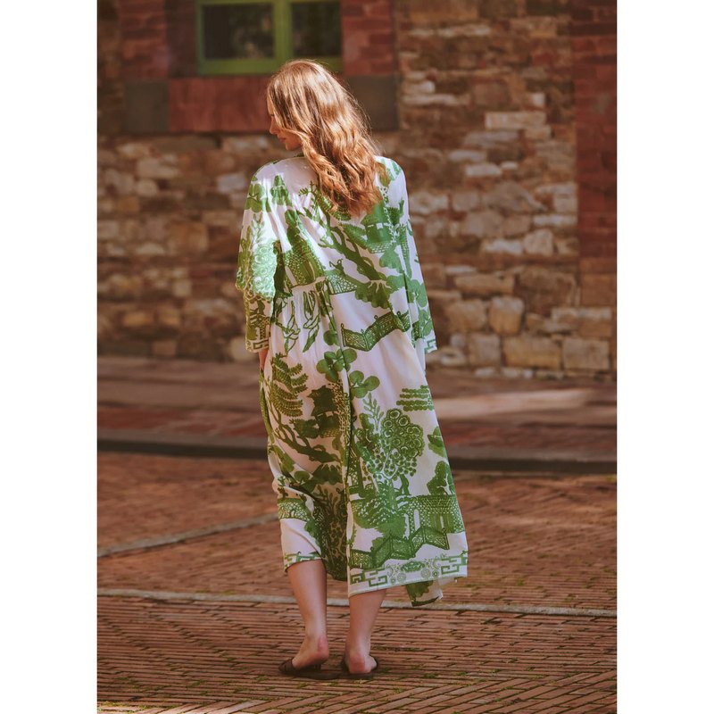 One Hundred Stars Giant Willow Green Pinch Pleat Dress on model lifestyle rear