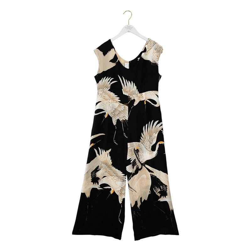 One Hundred Stars Stork Black Jumpsuit on hanger
